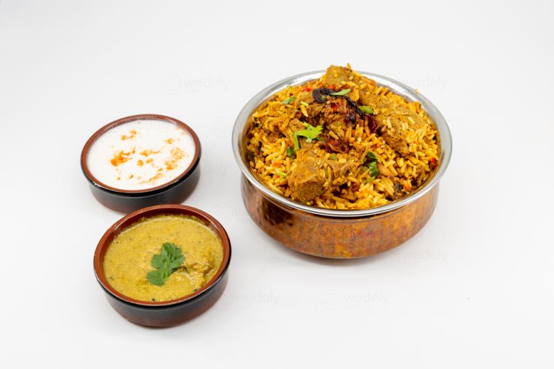 Hyderabadi Lamb Biryani With Mirchi Ka Salan And Raita